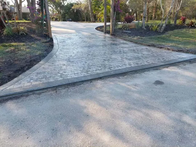 Stamped brick-pattern concrete driveway